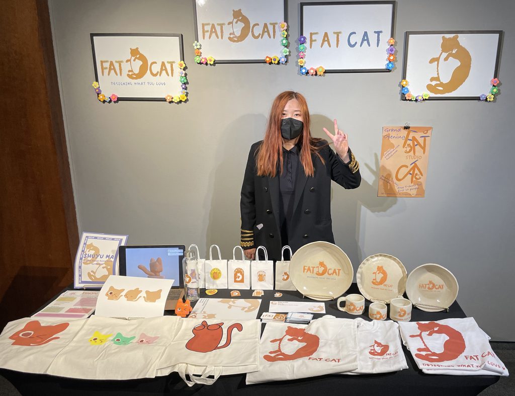 A photo of a student at the Senior Show SP22